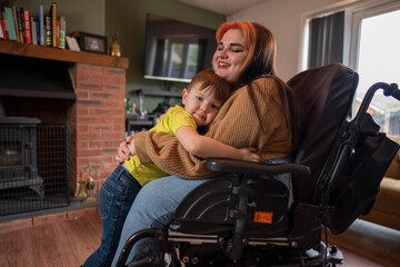 Fototapeta na wymiar Woman on wheelchair hugging son