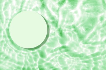 Empty white circle podium on transparent clear calm water texture with splashes and waves