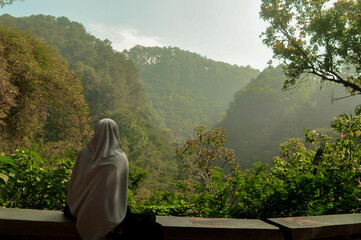 Muslimah Girl Sitting Alone on Nature
