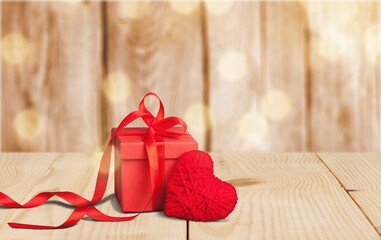 Red gift or present box with red bow