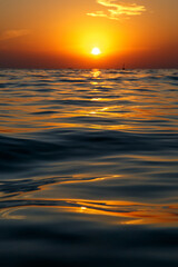 Fototapeta na wymiar The water surface at sunset.