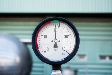 Close up gas pressure meter tubes valves