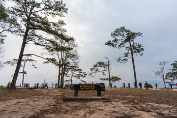 Tourists looking with a nature view at Nok Aen Cliff on Phu Kradueng mountain national park. the...