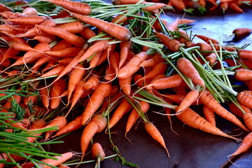Carrots, top leaves are trimmed off. to wait for the package to be sold