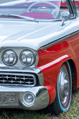 Fototapeta premium Classic car headlights on vintage old car, Classic car background, Taillight and classic design, Vintage car wallpaper, Retro vehicle concept of old automotive restoration auto detailing.