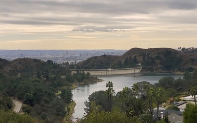 Fototapeta premium Water reservoir in the mountains in the evening 