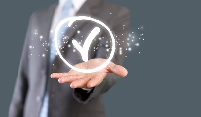 Hand shows the sign of the top service Quality assurance, Standards, certification