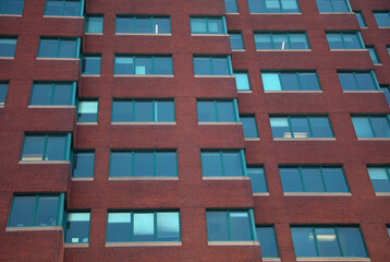 red brick building facade windows wall urban modern real estate