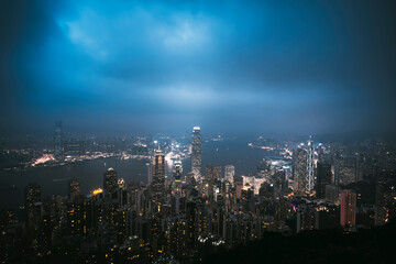 A view of the city at night from the top of the Taiping mountain in Hong Kong.