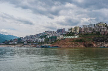 Yangtze River, China - Landscape, cruise ships and towns on both sides of the Three Gorges of the Yangtze River, China, May 31, 2011.