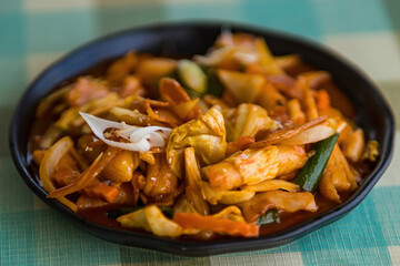 Korean rice cake stick with sausage in spicy sauce (Tteokbokki) - Korean food style