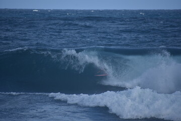 surfer getting barreled