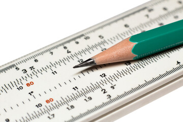 Pencil on an engineering ruler, an architect's and engineer's tool
