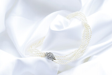 Pearl Design Necklace on White Shiny background