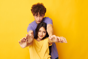 cute young couple Friendship posing fun studio isolated background unaltered