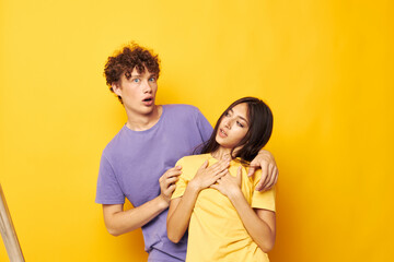 teenagers Friendship posing fun studio yellow background unaltered