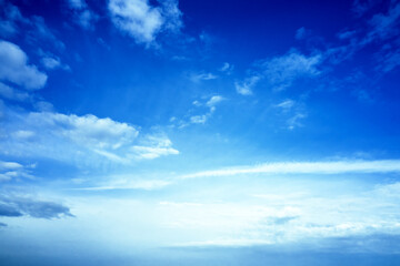 blue cloudy sky on a sunny day background screensaver backdrop