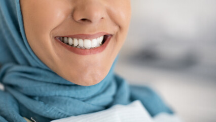 Perfect Smile Concept. Closeup Shot Of Islamic Lady In Hijab Widely Smiling