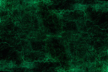 Abandoned old cracked green cement plaster wall surface with heavy grunge texture for background