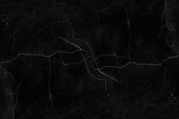 Black cement plaster wall surface with abstract crack lines for background