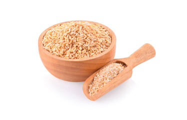 roasted uncooked rice in a bowl isolated on white background