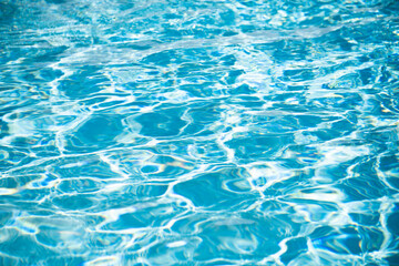 Blue ripped water in swimming pool, water pool texture and surface water backgraund.
