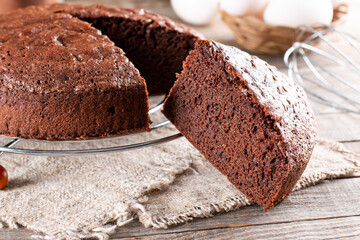 Fresh chocolate sponge cake. Chiffon biscuit for cake - obrazy, fototapety, plakaty
