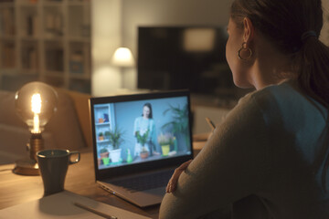 Woman learning gardening online
