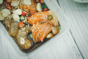 Pickled shrimp and salmon with soy sauce