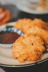 Sweet corn fritters or deep fried corn cake
