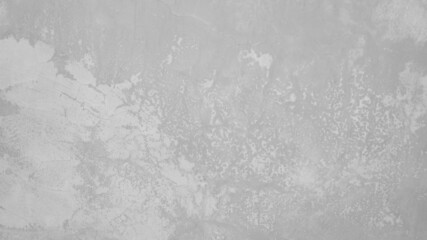 The old cement wall was weathered, the surface was scratched, the surface was scratched and damaged. For a mysterious retro-conservative background.