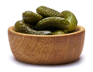 Bowl of Tasty canned Whole green cornichons isolated on a white background