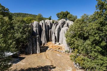 In the ancient city of Selge in Antalya, “Adam Kayalar,”means “Man Rocks” resemble several...
