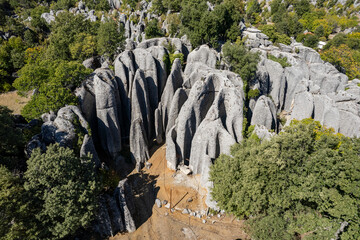 In the ancient city of Selge in Antalya, “Adam Kayalar,”means “Man Rocks” resemble several...