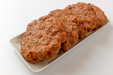 Tteokgalbi on a white background