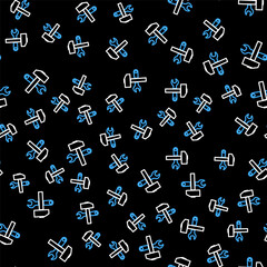 Line Crossed hammer and wrench icon isolated seamless pattern on black background. Hardware tools. Vector