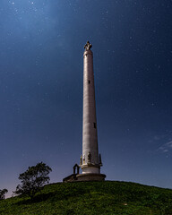 High tower under a starry night sky in Galicia. High quality photo