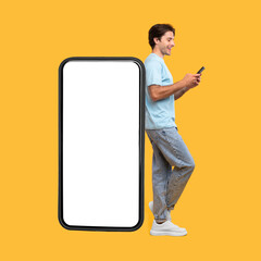 Man leaning on white empty smartphone screen and using phone