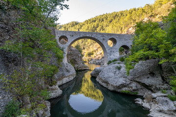 Fototapeta na wymiar Ali Brige. Gundogmus, Antalya. Very beautiful stone bridge. Beautiful port of the silk road