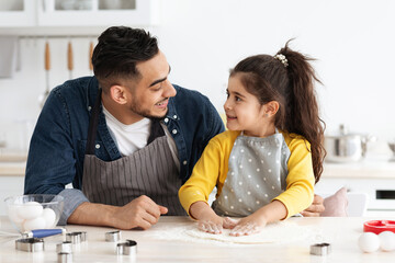 Cute Little Arab Girl Baking In Kitchen With Her Dad