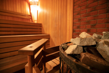 Fototapeta na wymiar Interior of a modern wood-fired sauna. Steam room.