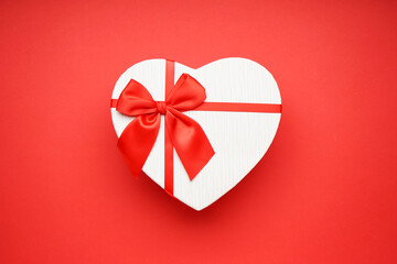 Gift boxes for Valentine's Day on red background. Flat lay.