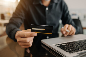 Business woman hands using smartphone and holding credit card as Online shopping