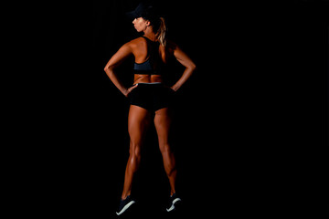 Fototapeta na wymiar Fitness female woman with muscular body, do her workout. Attractive sexy fitness woman, trained female body, lifestyle portrait, caucasian model.