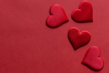 Red background with red hearts, st. Valentine day concept, top view