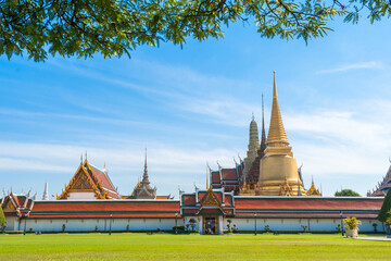 Golden pagoda in Grand Palace, Wat Phra Kaew, temple of the Emerald Buddha, famous travel destination, Bangkok Thailand.