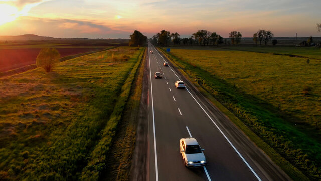 Amazing Aerial Drone View: Cars going by Road.