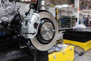 Fototapeta premium Photo of car bodies are on assembly line. Factory for production of cars. Modern automotive industry