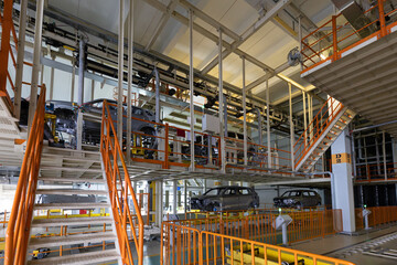 Automobile production line. Welding car body. Modern car assembly plant. Auto industry. Interior of a high-tech factory