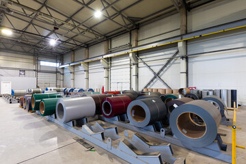 Photo shot of rolls of steel sheet stored in warehouse; Cold rolled steel coils at the factory